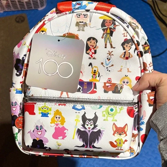 Disney 100 Mini Backpack Purse with Multi Character Allover Print & Molded Metal Amazon.com: Disney 100 Mini Backpack Purse with Multi  main image 2
